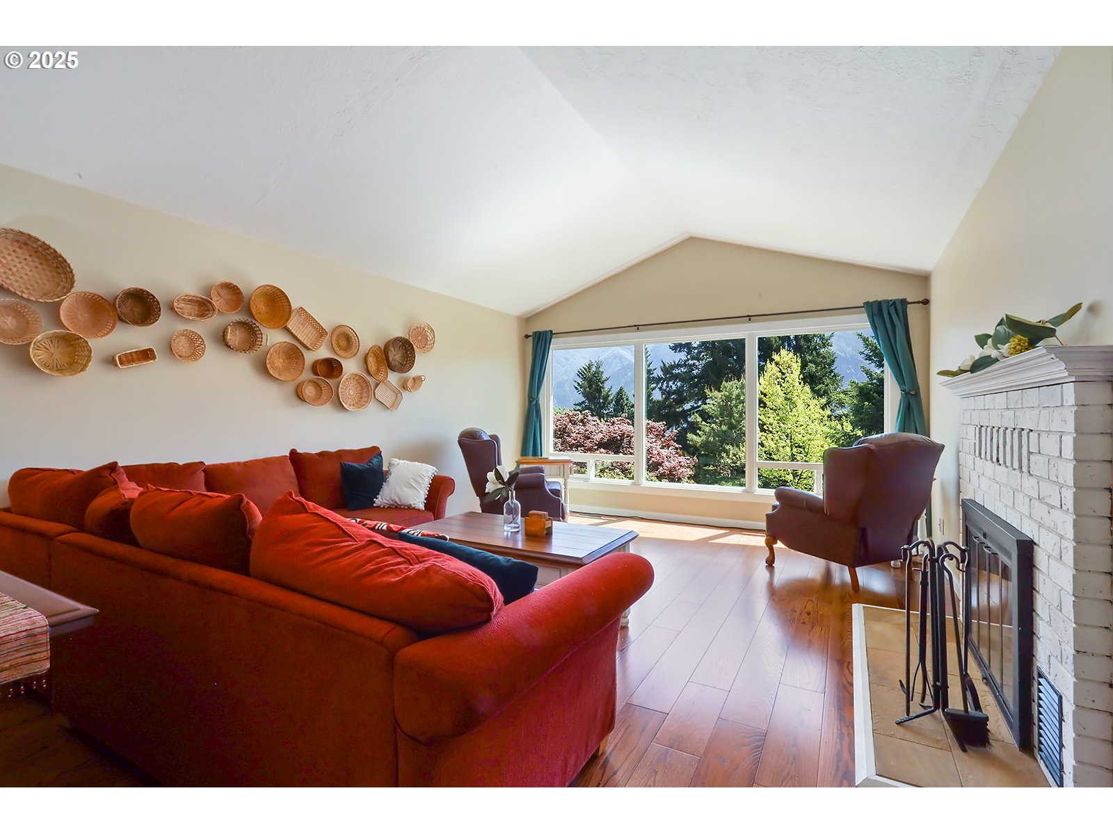 101 Allen Street Carson, WA 98610 - Photo 21 of 48 a living room with furniture and a large window