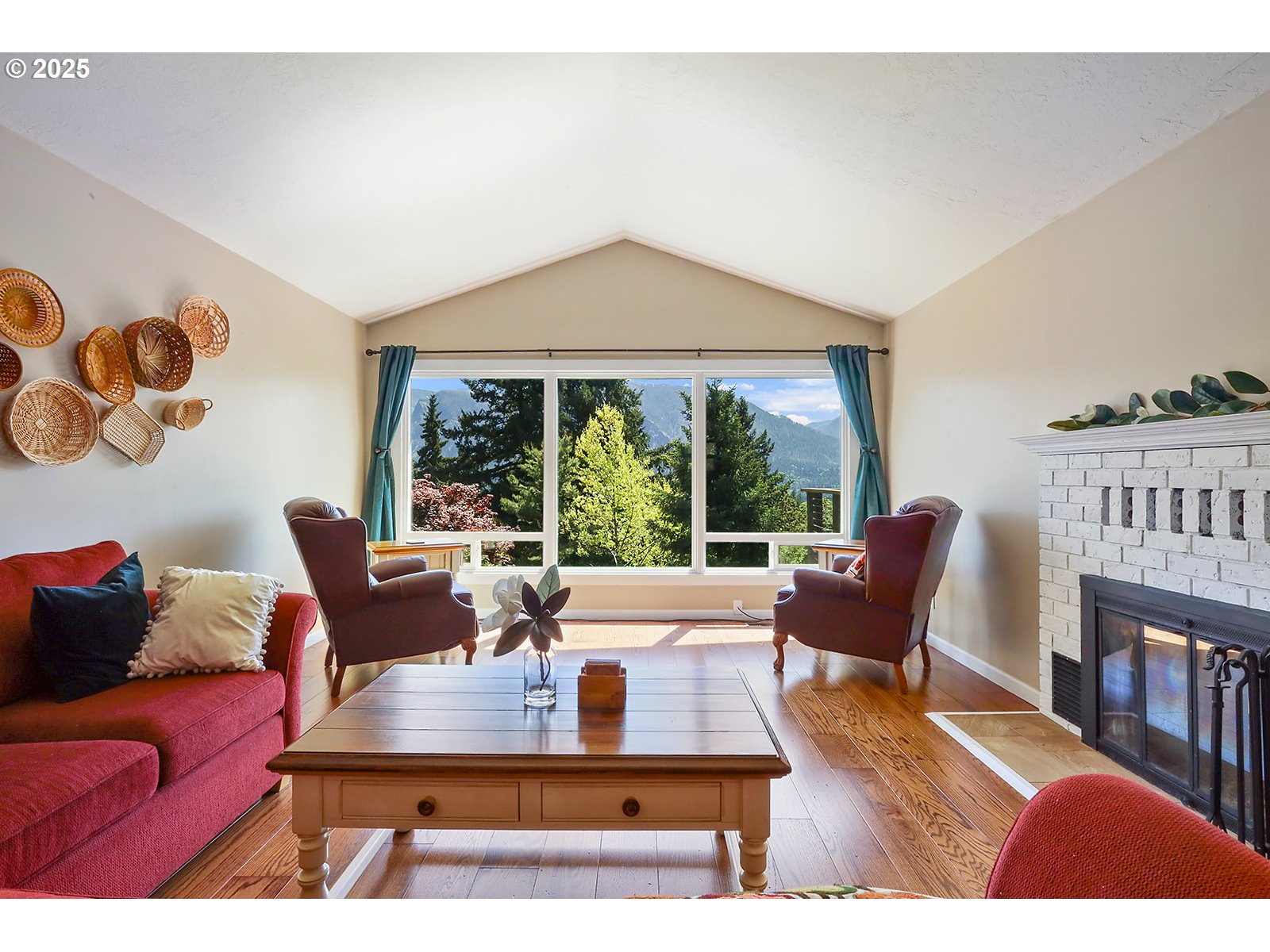 101 Allen Street Carson, WA 98610 - Photo 22 of 48 a living room with furniture and a large window