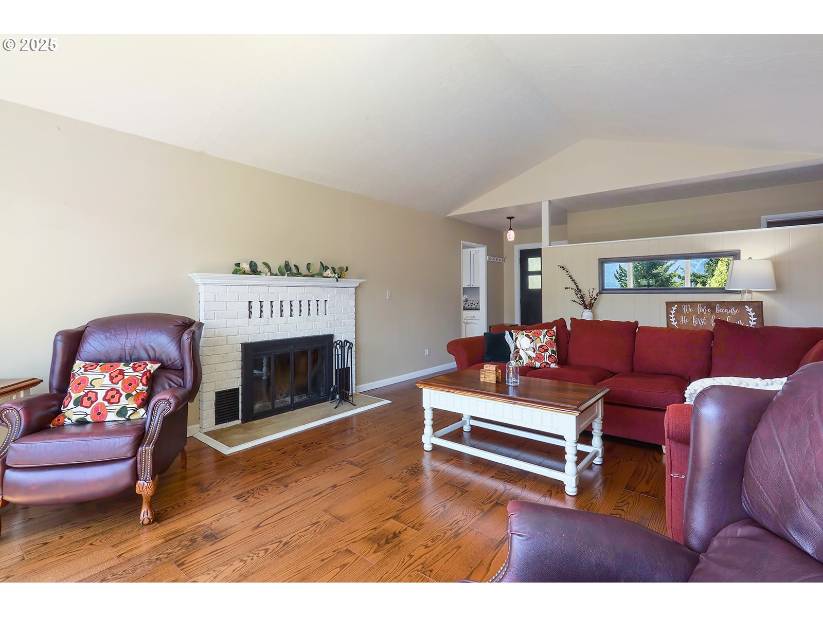 101 Allen Street Carson, WA 98610 - Photo 23 of 48 a living room with furniture and a fireplace