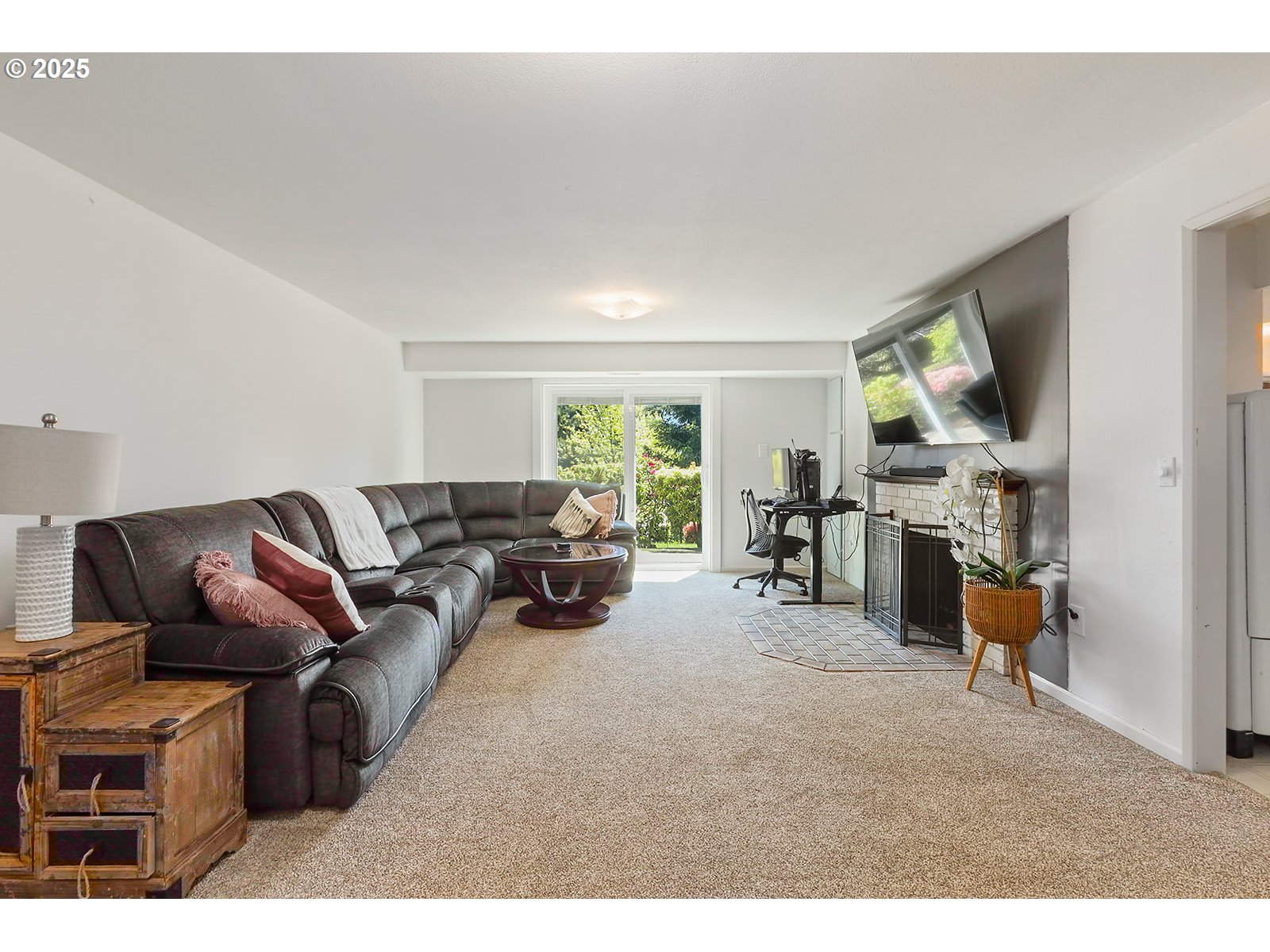 101 Allen Street Carson, WA 98610 - Photo 25 of 48 a living room with furniture and a flat screen tv