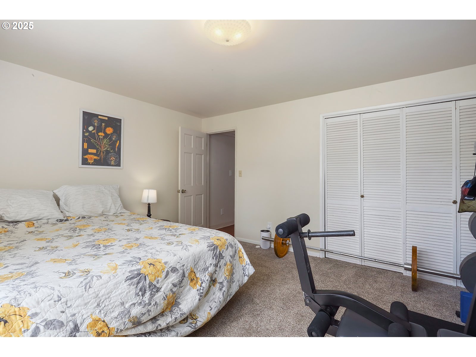 101 Allen Street Carson, WA 98610 - Photo 27 of 48 a bedroom with a bed a table and painting