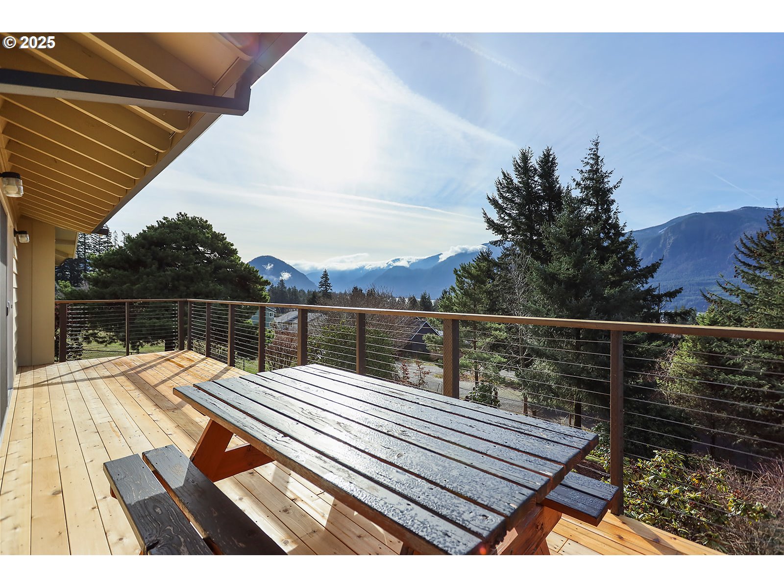 101 Allen Street Carson, WA 98610 - Photo 44 of 48 a view of deck with mountain view and wooden floor