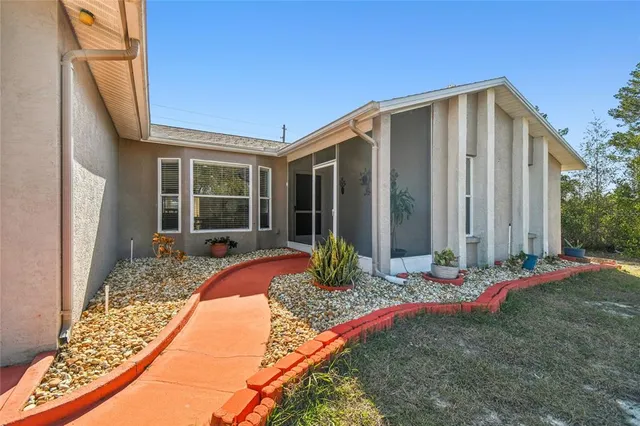 a kitchen with lots of counter top space appliances and a center island