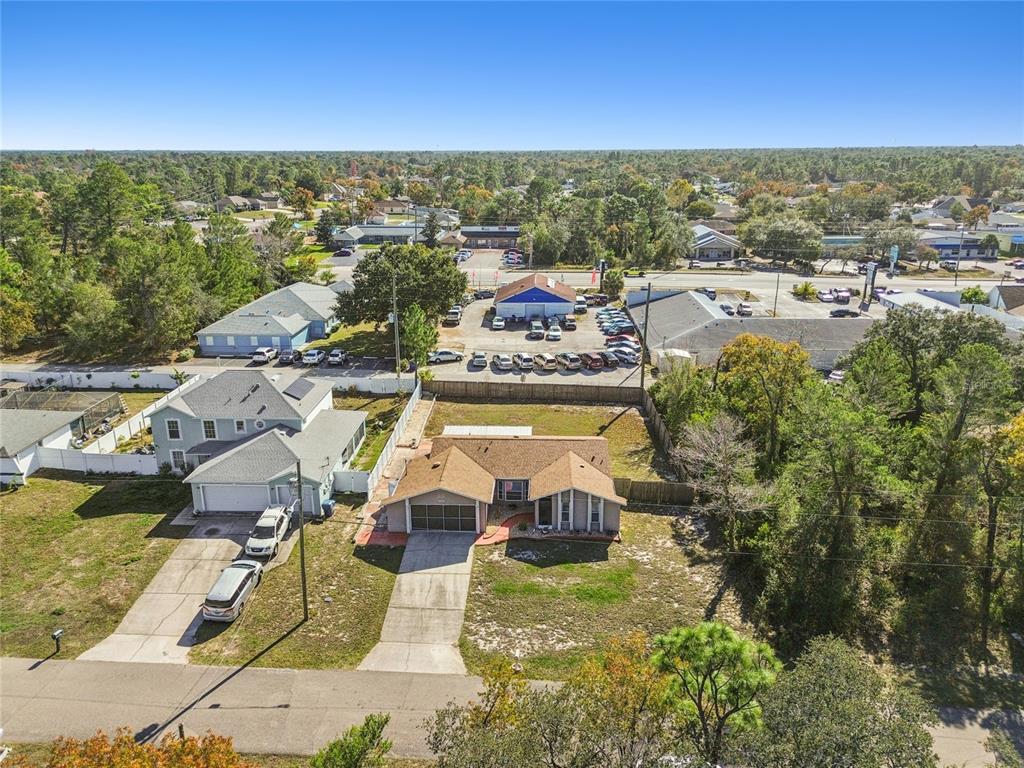 13170 Pirate Lane Spring Hill, FL 34609 - Photo 68 of 83 an aerial view of residential houses with outdoor space