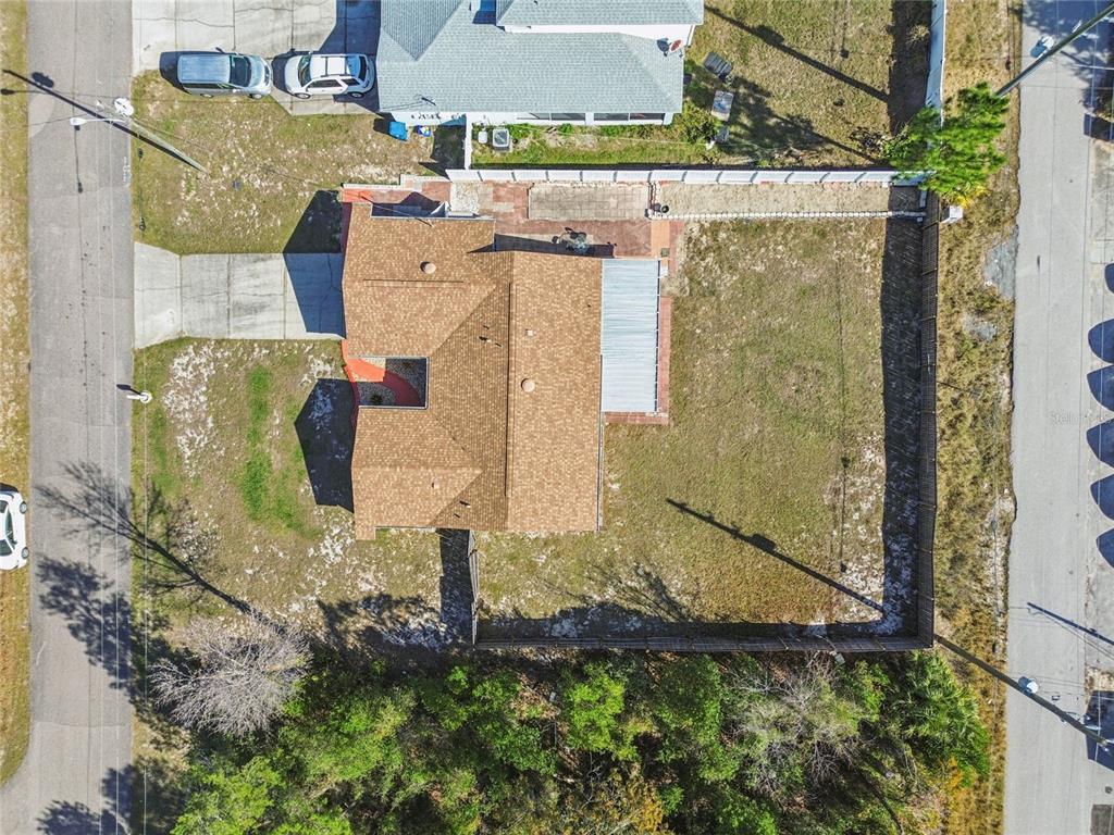13170 Pirate Lane Spring Hill, FL 34609 - Photo 73 of 83 an aerial view of a house with a yard
