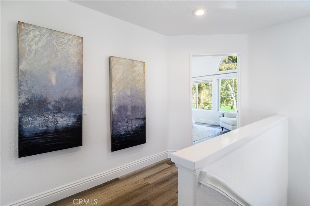 5 Telliz Rancho Santa Margarita, CA 92688 - Photo 30 of 58 a view of a hallway with natural light