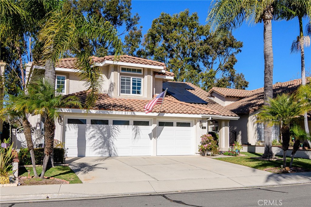 5 Telliz Rancho Santa Margarita, CA 92688 - Photo 3 of 58 a front view of a house with porch