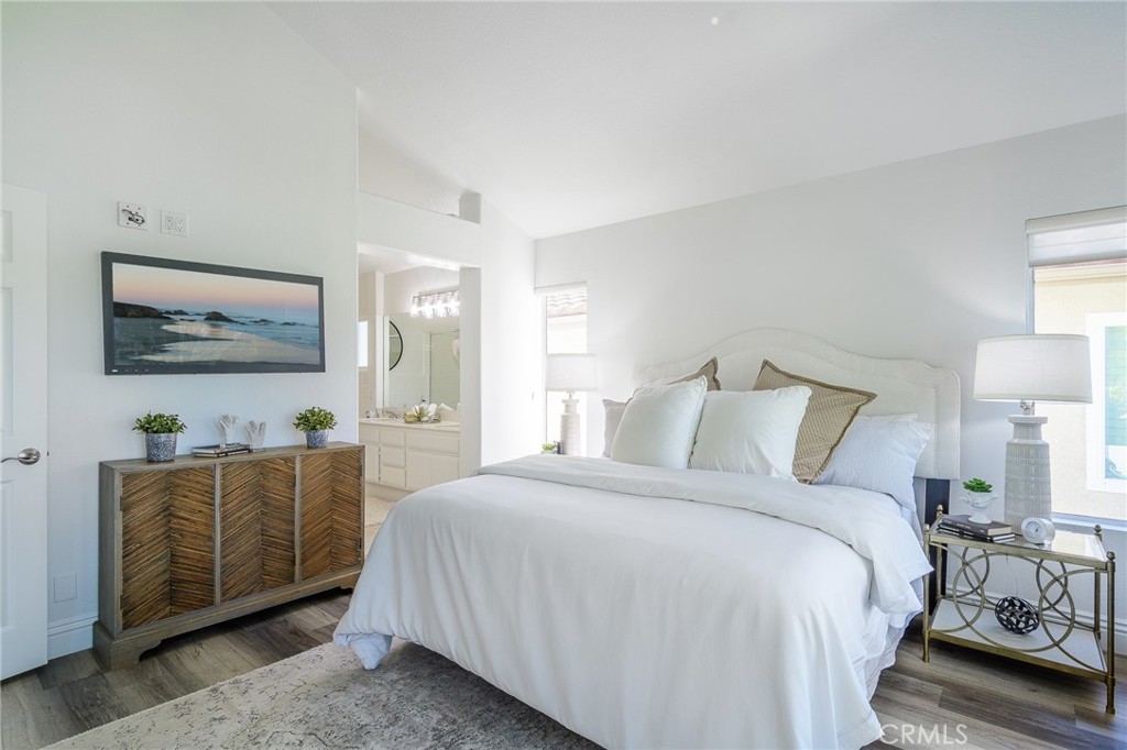 5 Telliz Rancho Santa Margarita, CA 92688 - Photo 32 of 58 a bedroom with a bed and a flat screen tv