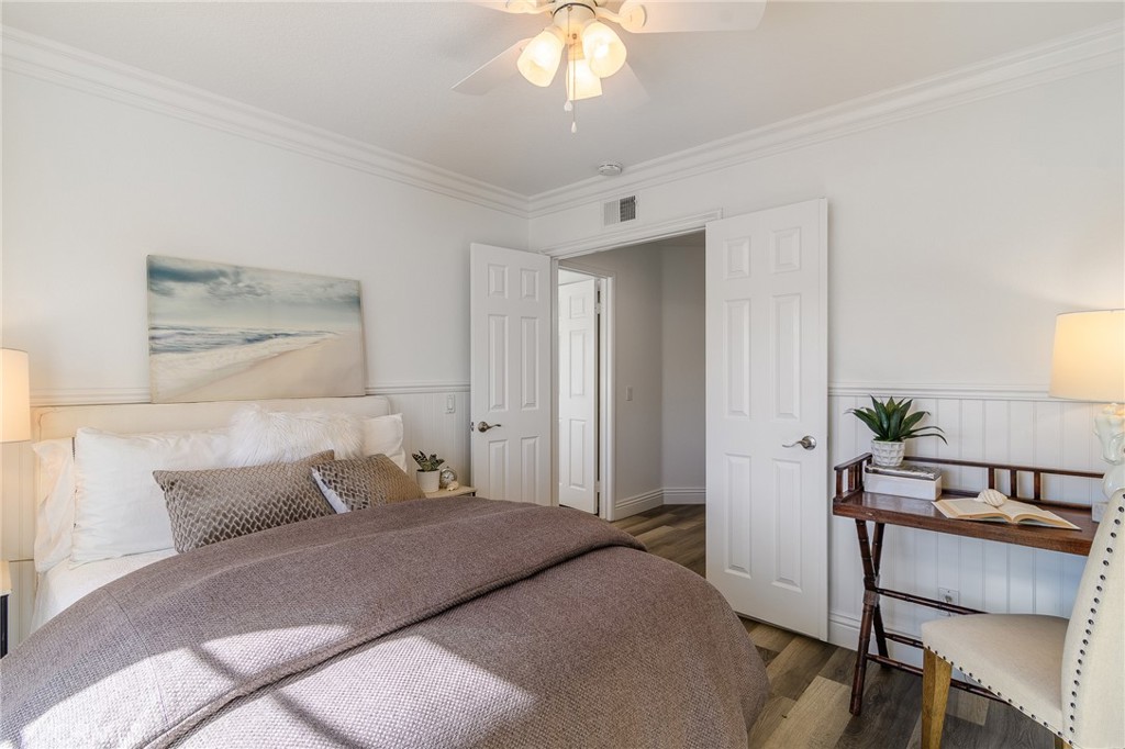 5 Telliz Rancho Santa Margarita, CA 92688 - Photo 40 of 58 a bedroom with a bed and a dresser in it