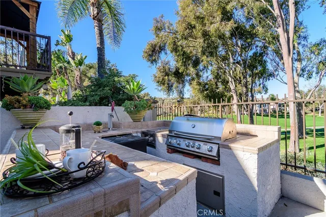 a swimming pool with outdoor seating and yard