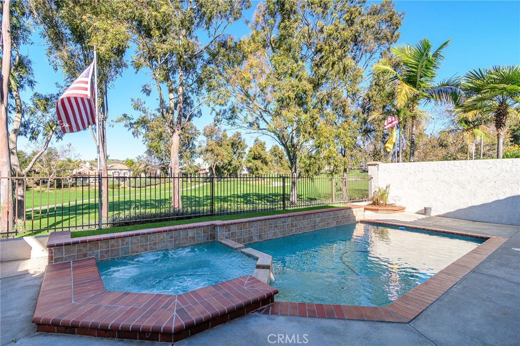 5 Telliz Rancho Santa Margarita, CA 92688 - Photo 47 of 58 a view of a backyard and swimming pool