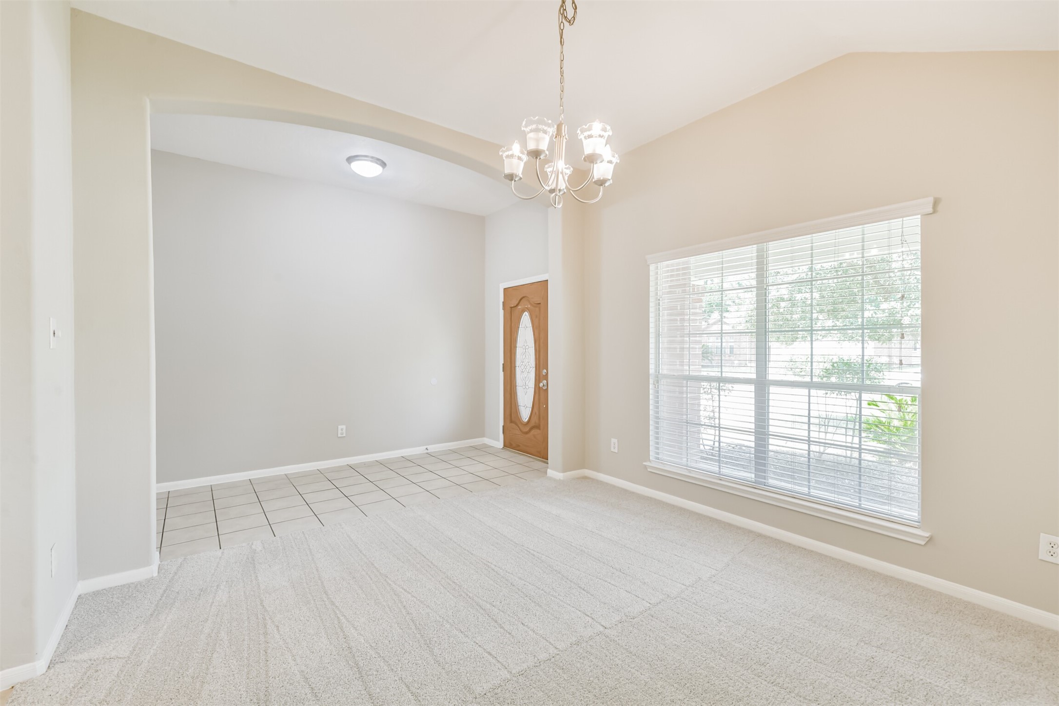 8331 Loetsch Ridge Way Spring, TX 77379 - Photo 8 of 31 Formal dining with elegant chandelier.