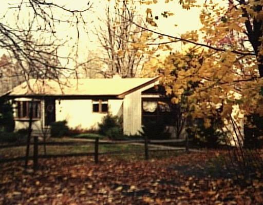 57 Chambers Road Danbury, CT 06811 - Photo 1 of 1 a view of a yard with wooden fence