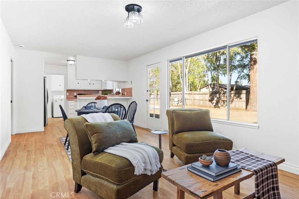 8 Cottage Circle Chico, CA 95926 - Photo 11 of 46 a living room with furniture and a window