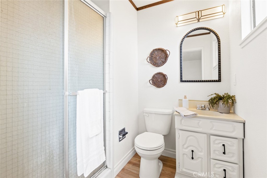 8 Cottage Circle Chico, CA 95926 - Photo 19 of 46 a bathroom with a toilet sink vanity and mirror