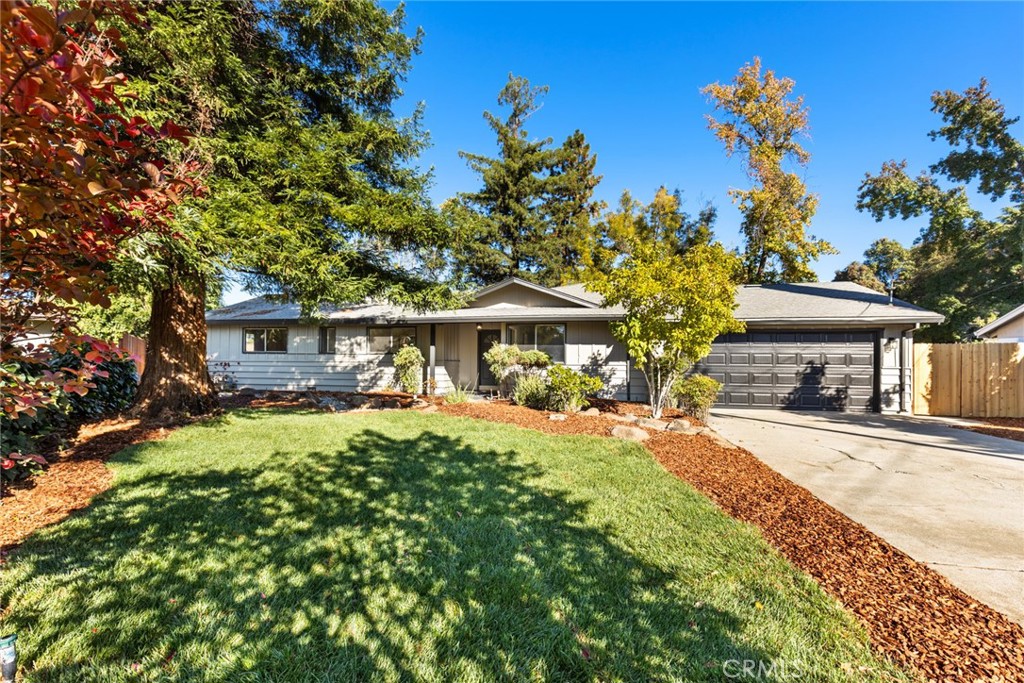 8 Cottage Circle Chico, CA 95926 - Photo 2 of 46 a front view of a house with a yard
