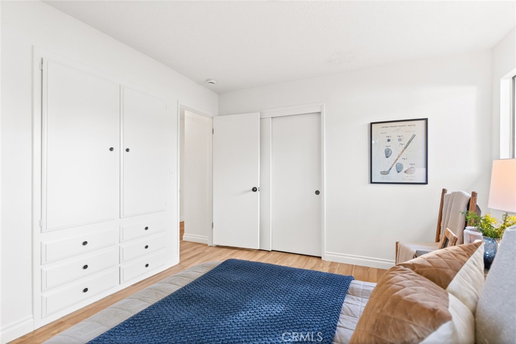 8 Cottage Circle Chico, CA 95926 - Photo 21 of 46 a view of a bedroom with wooden floor