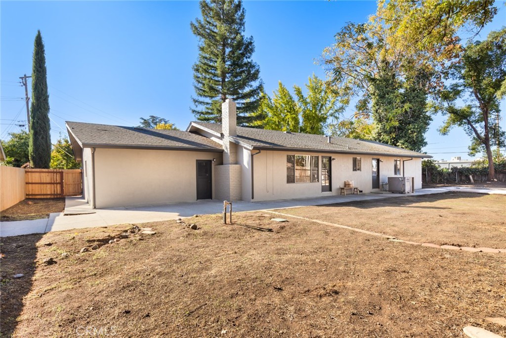 8 Cottage Circle Chico, CA 95926 - Photo 29 of 46 a front view of a house with a yard and garage