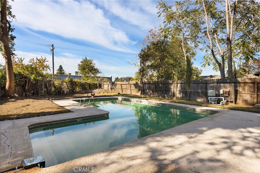 8 Cottage Circle Chico, CA 95926 - Photo 43 of 46 a swimming pool with outdoor seating and yard
