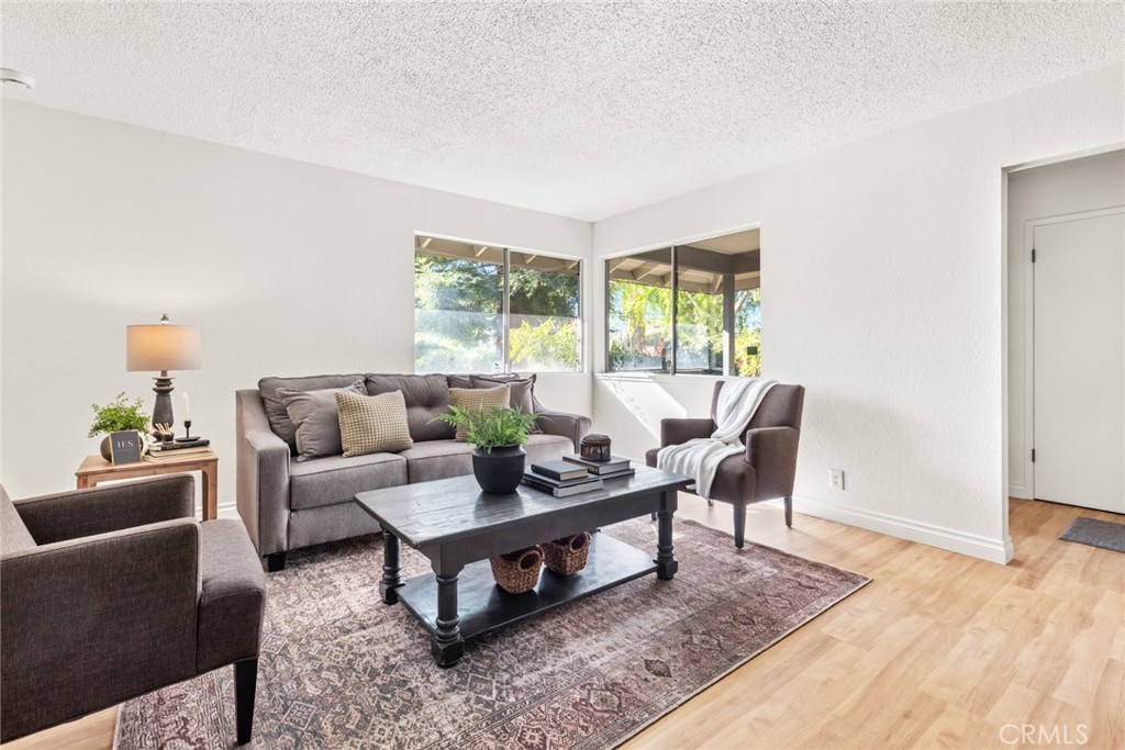 8 Cottage Circle Chico, CA 95926 - Photo 5 of 46 a living room with furniture and a window