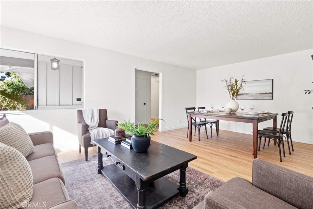 8 Cottage Circle Chico, CA 95926 - Photo 6 of 46 a living room with furniture potted plant and kitchen view