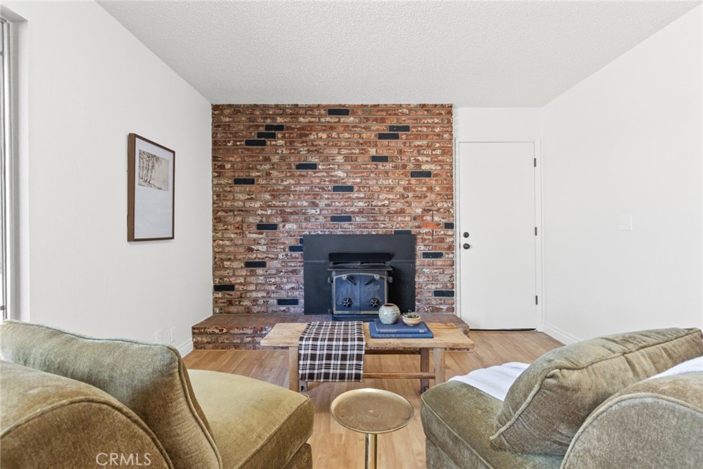 8 Cottage Circle Chico, CA 95926 - Photo 10 of 46 a living room with furniture and a fireplace