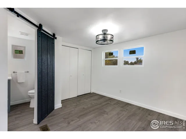 a view of livingroom with furniture and wooden floor