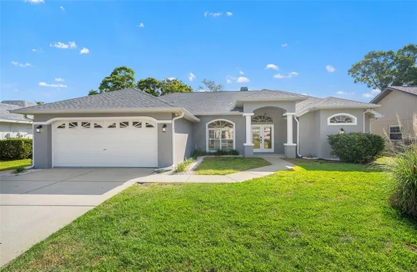 $320,000 | 13602 Glaze Brook Drive, Hudson, FL 34667