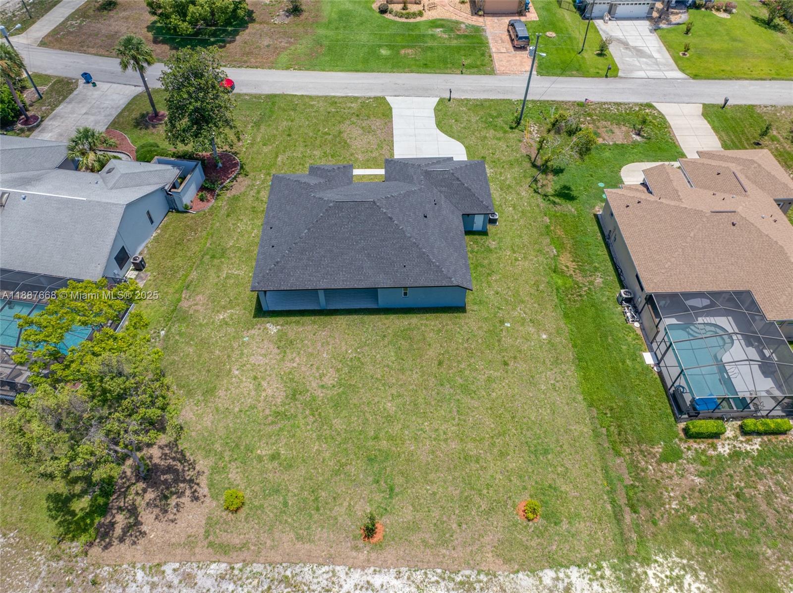 5317 Lydia Court Spring Hill, FL 34608 - Photo 8 of 10 an aerial view of houses with yard