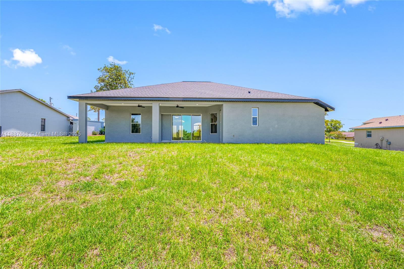 5317 Lydia Court Spring Hill, FL 34608 - Photo 9 of 10 a house view with a garden space