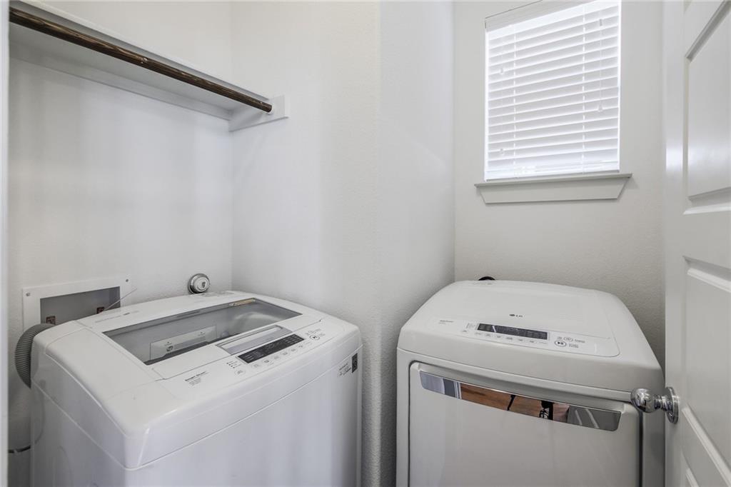 5809 Swayden Lane Austin, TX 78745 - Photo 6 of 10 laundry room with washer and dryer included