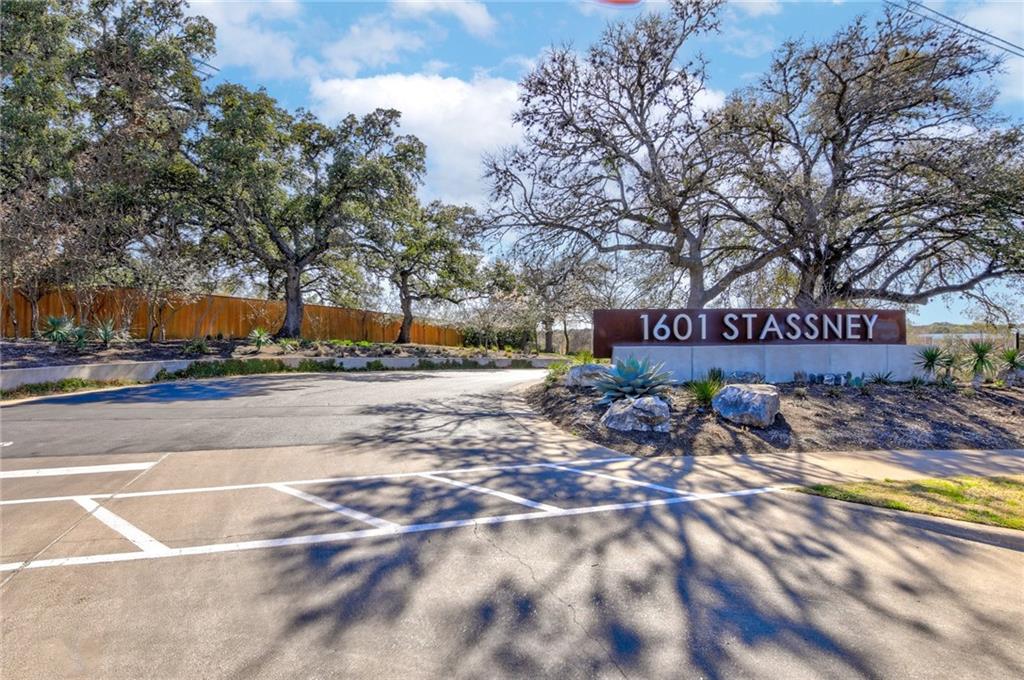 5809 Swayden Lane Austin, TX 78745 - Photo 10 of 10 Entrance drive to gated South Austin community with easy access to downtown and major trafficways