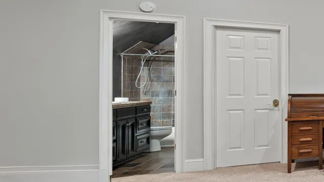 a view of a patio with a table and chairs