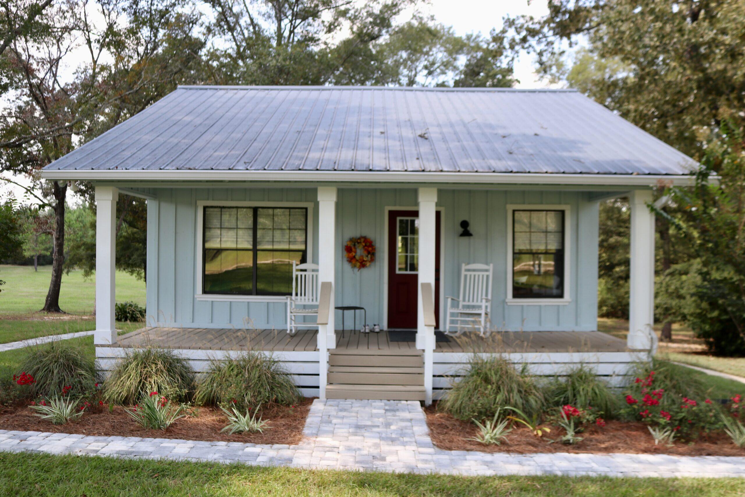 261 Wilkerson Road DeFuniak Springs, FL 32433 - Photo 4 of 15 a front view of a house with garden