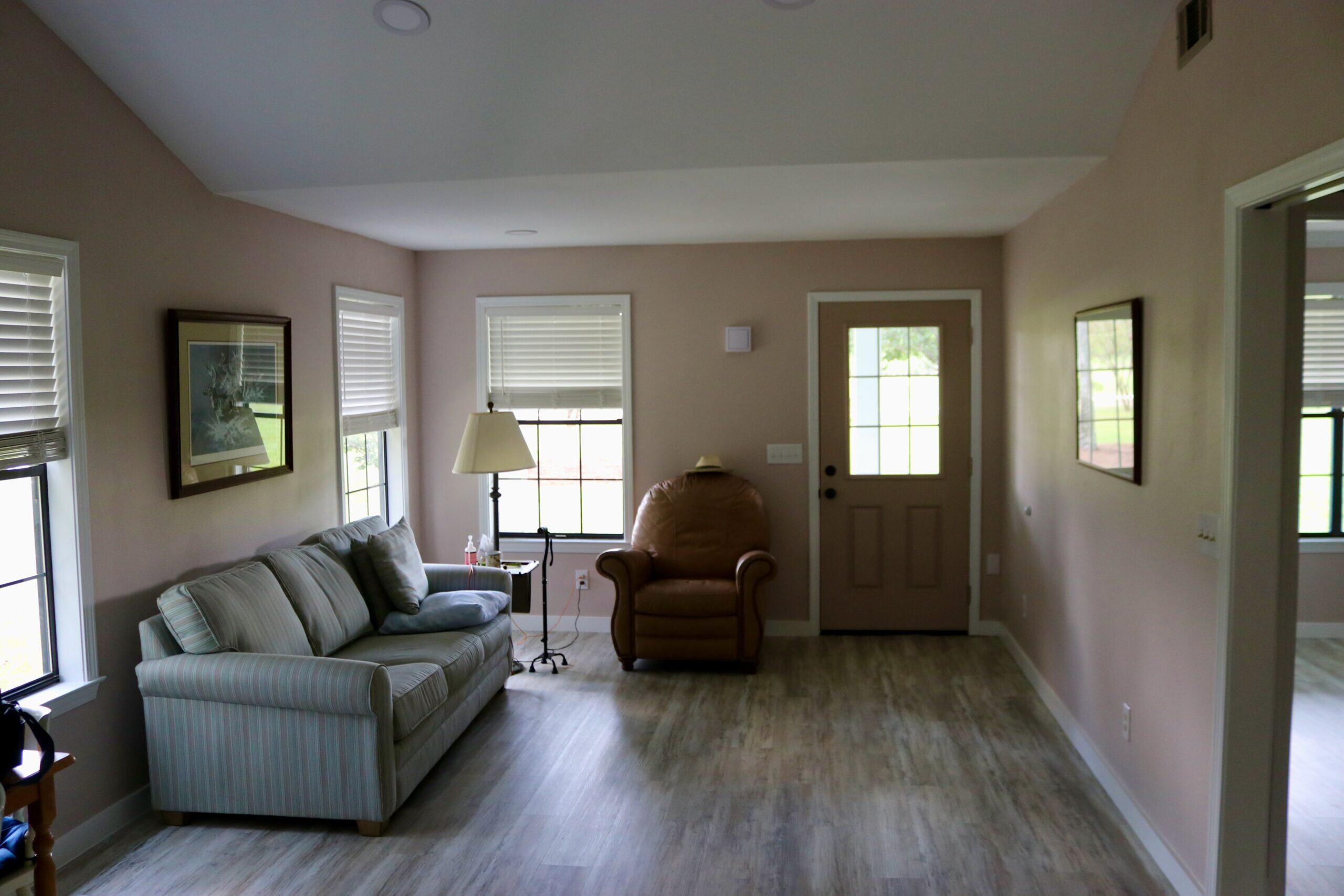 261 Wilkerson Road DeFuniak Springs, FL 32433 - Photo 6 of 15 a living room with furniture and a wooden floor