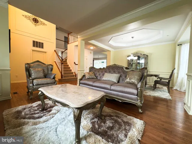 a kitchen with stainless steel appliances granite countertop a stove sink and cabinets