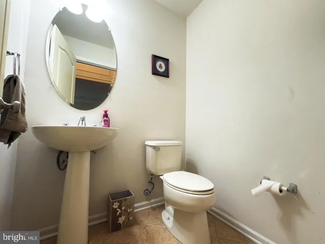 a view of a hallway with staircase