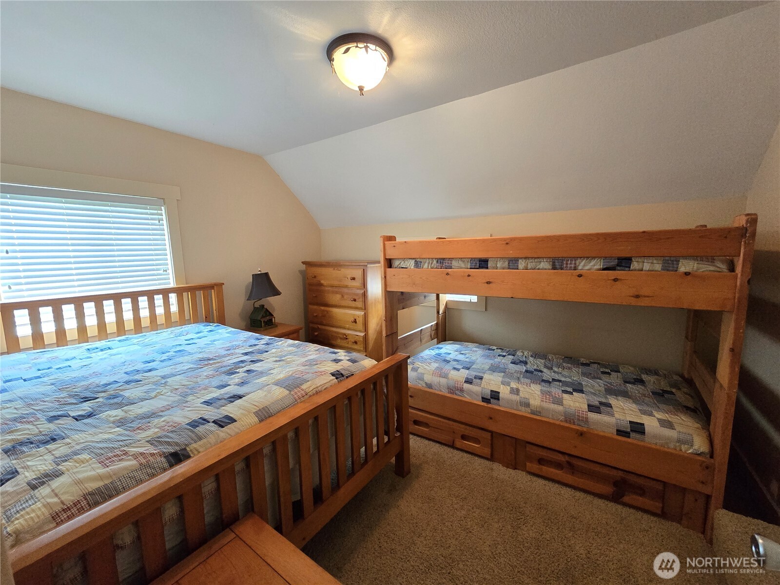 912 Middle Satsop Road Montesano, WA 98563 - Photo 17 of 37 a bedroom with a bed and a dresser