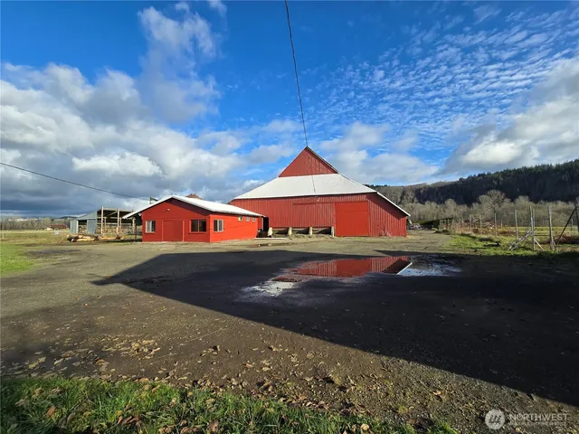 a view of a backyard of the house