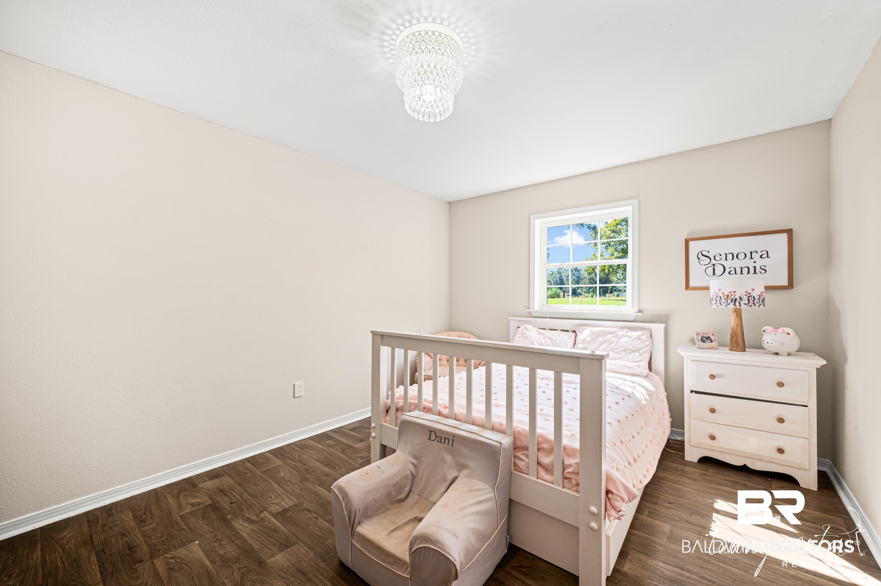 3086 Wild Fork Road Frisco City, AL 36445 - Photo 10 of 30 Bedroom featuring baseboards and dark wood-style flooring