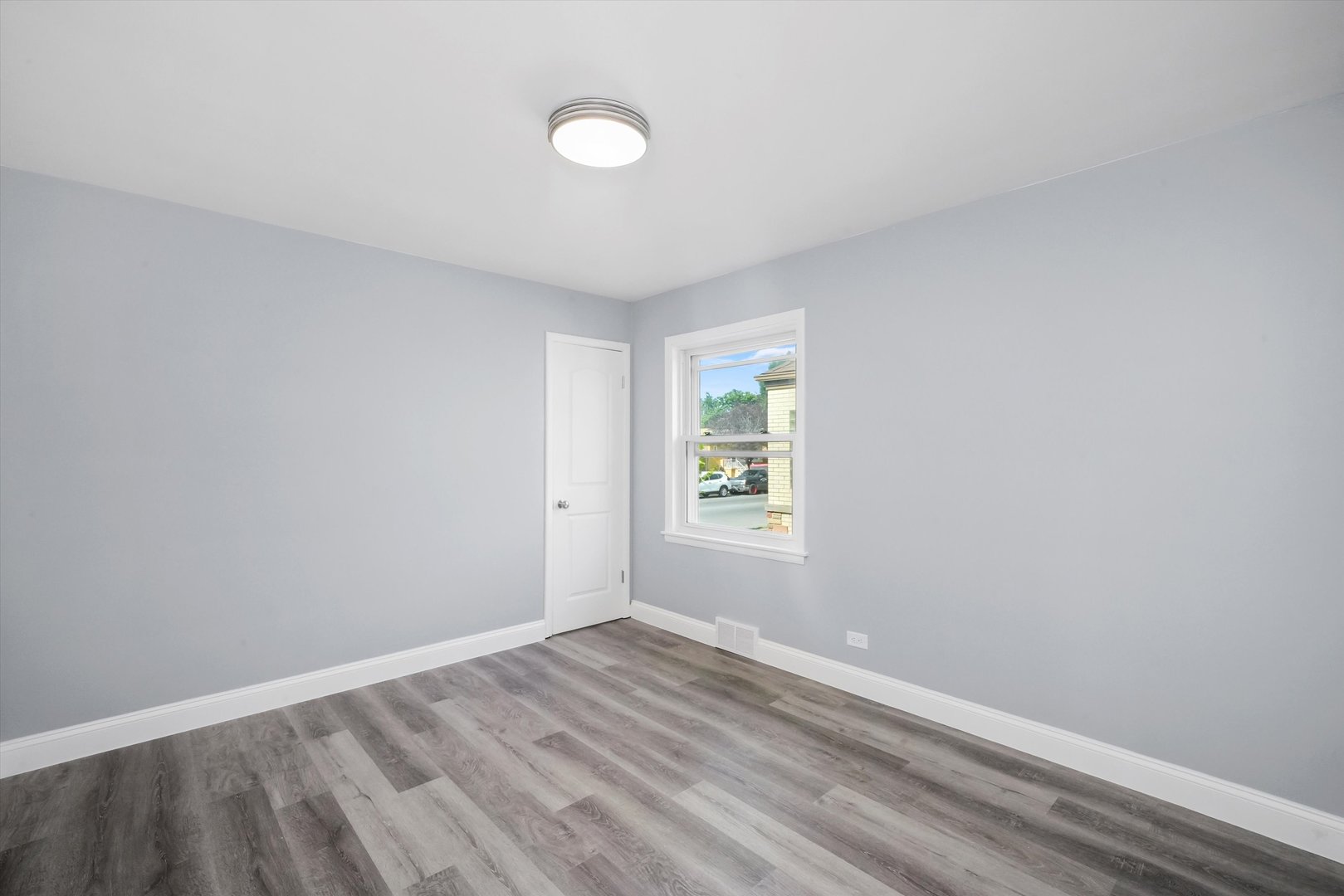 4353 West Marquette Road Chicago, IL 60629 - Photo 13 of 47 an empty room with a window