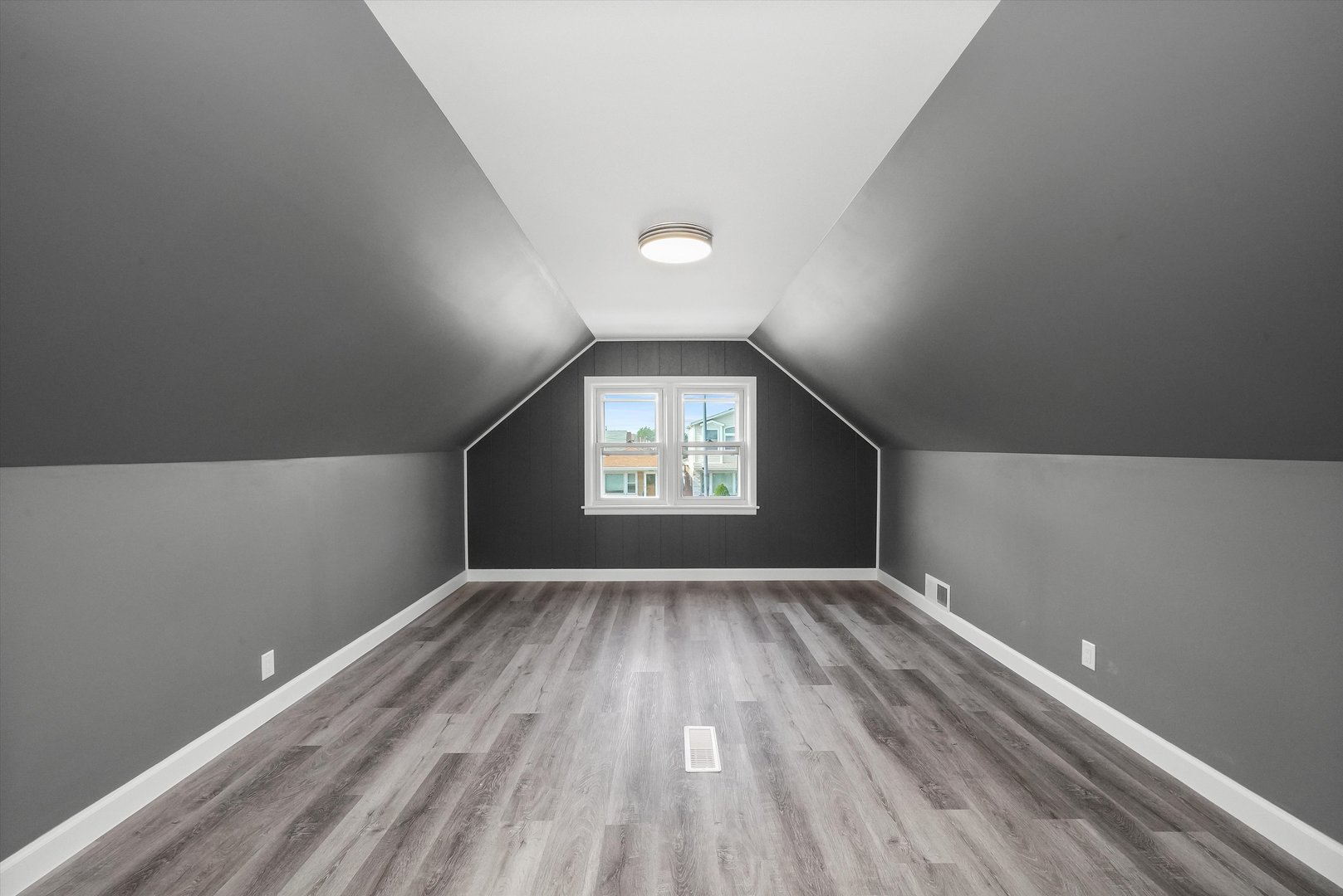 4353 West Marquette Road Chicago, IL 60629 - Photo 23 of 47 wooden floor in an empty room with a window