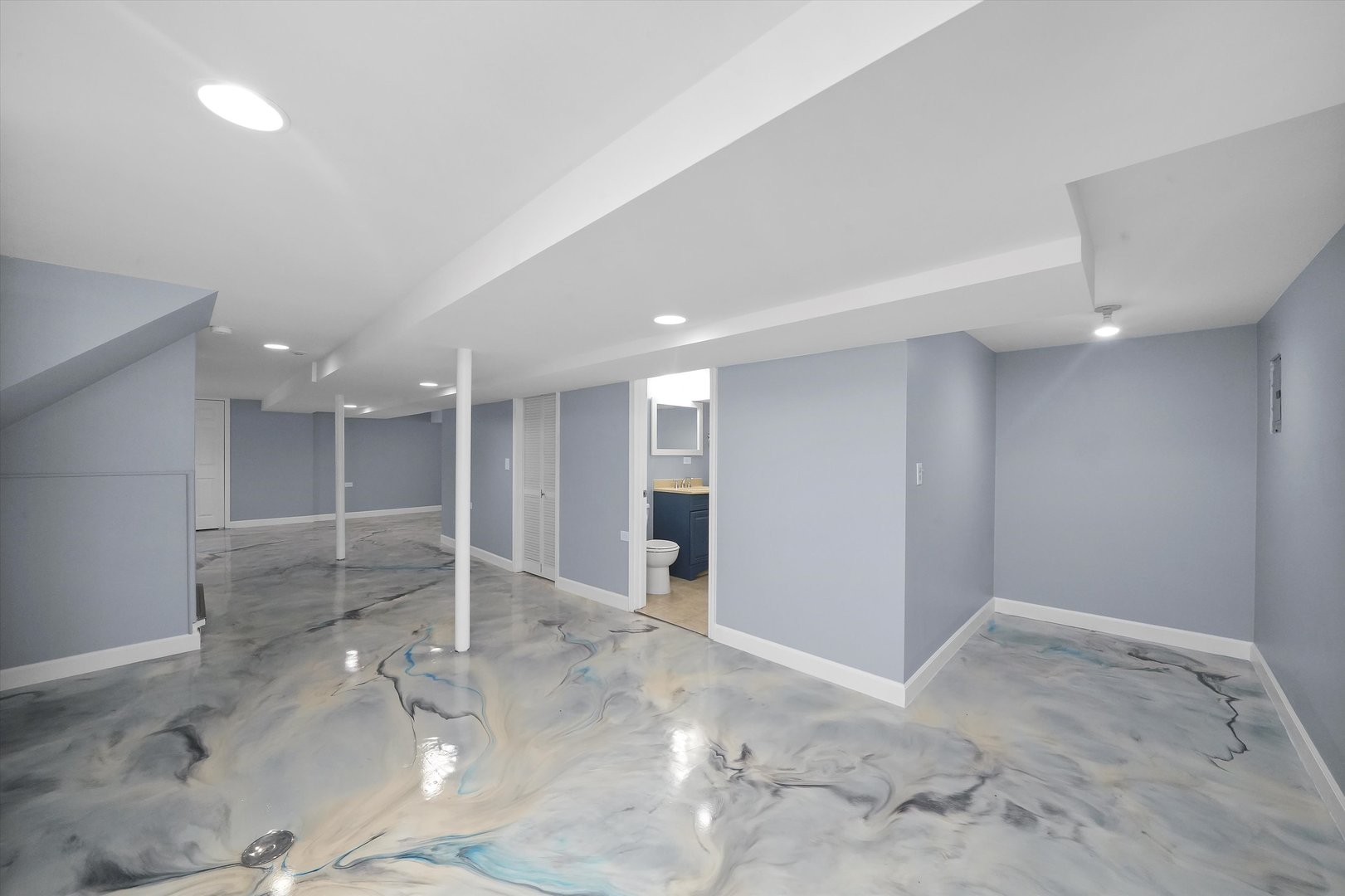 4353 West Marquette Road Chicago, IL 60629 - Photo 33 of 47 a view of a livingroom with wooden floor and sink