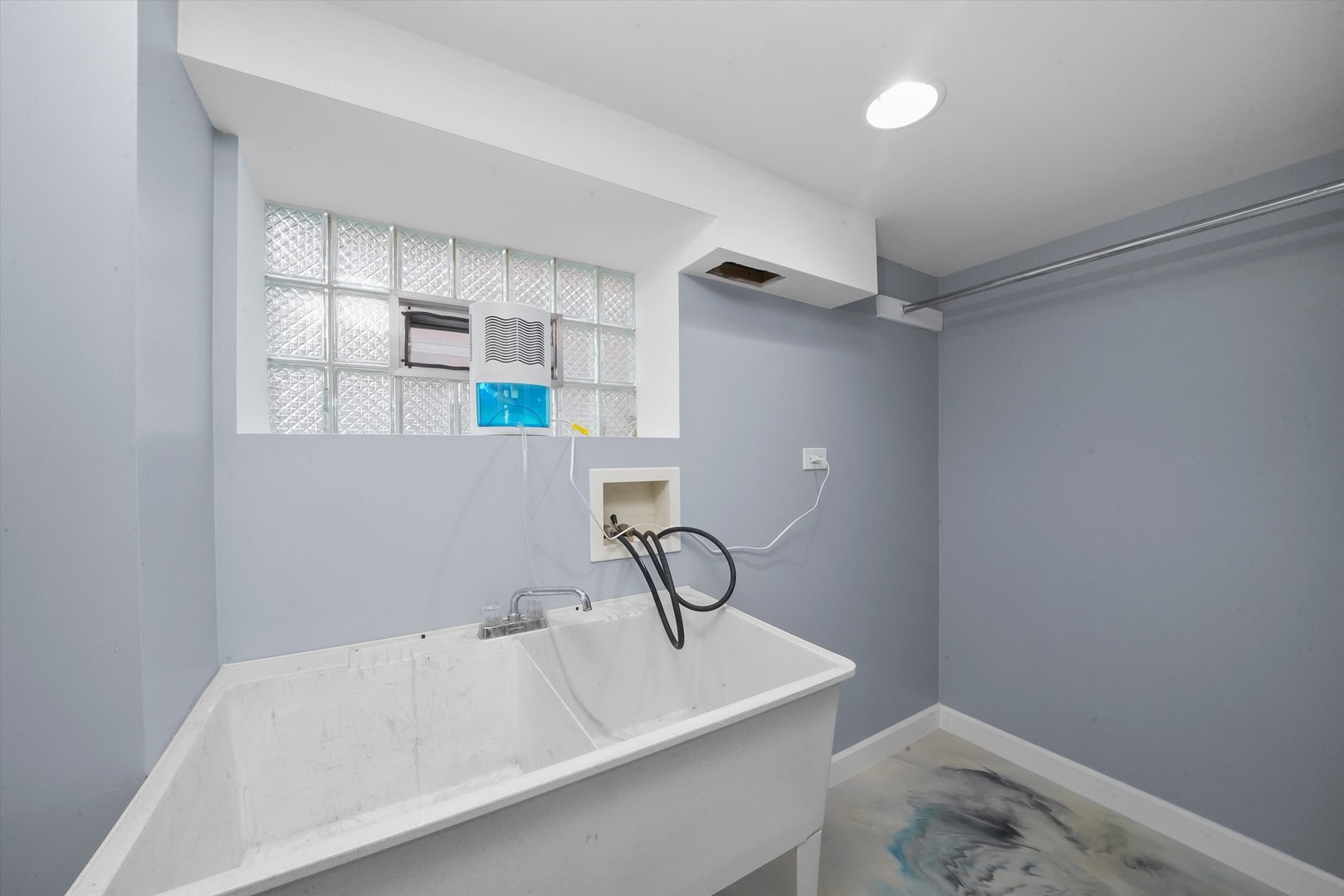 4353 West Marquette Road Chicago, IL 60629 - Photo 34 of 47 a bathroom with a bathtub and a window