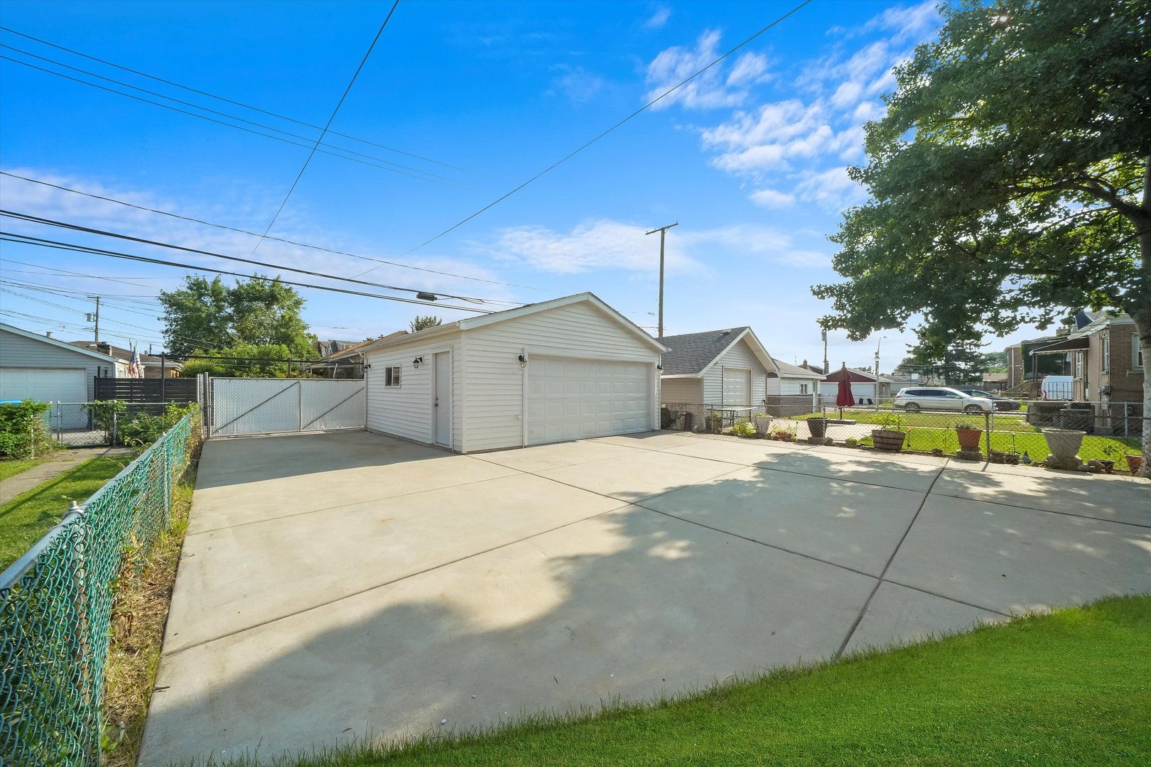 4353 West Marquette Road Chicago, IL 60629 - Photo 39 of 47 a view of a house with outdoor space and sitting area