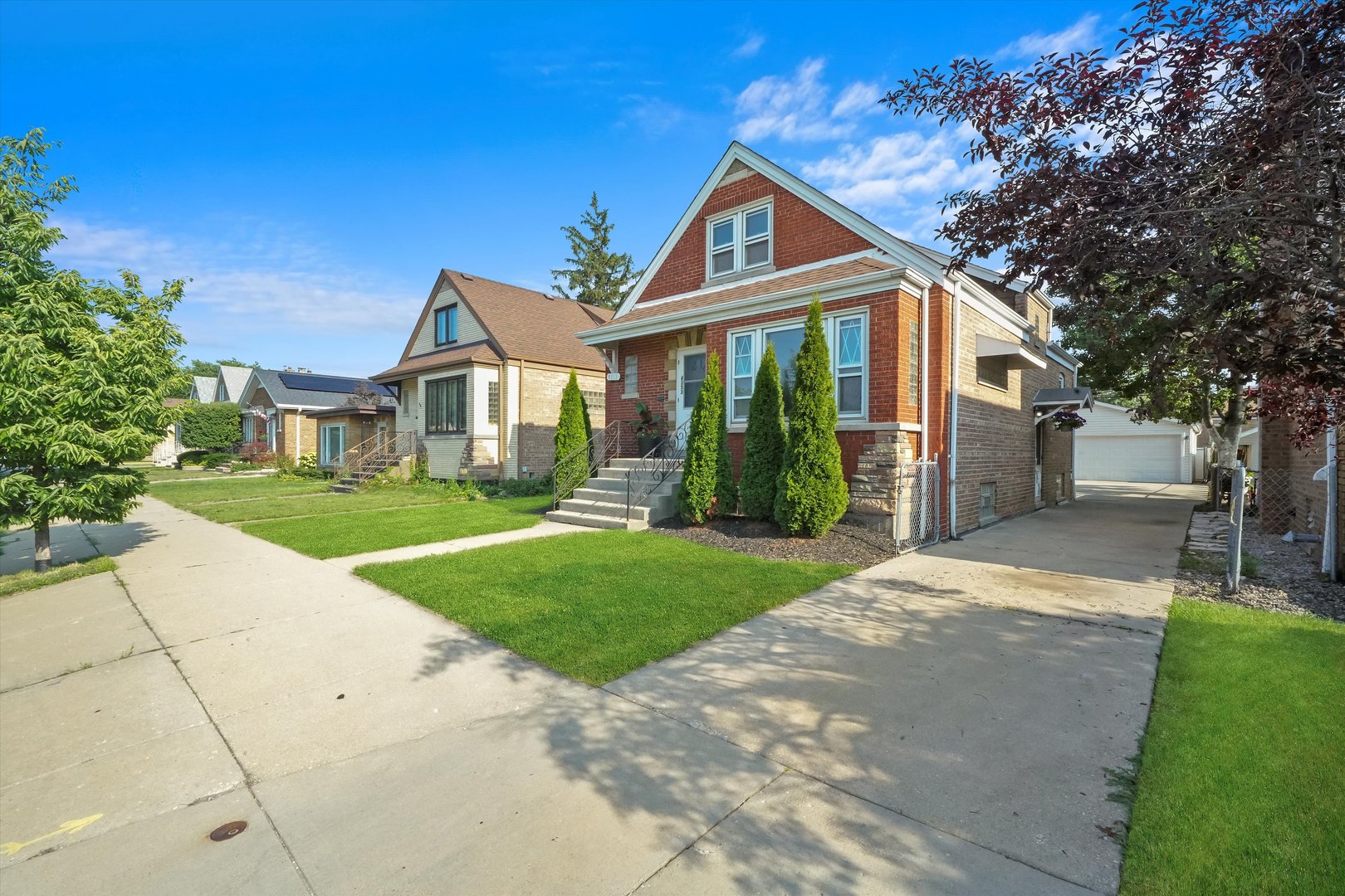 4353 West Marquette Road Chicago, IL 60629 - Photo 4 of 47 a front view of a house with a yard