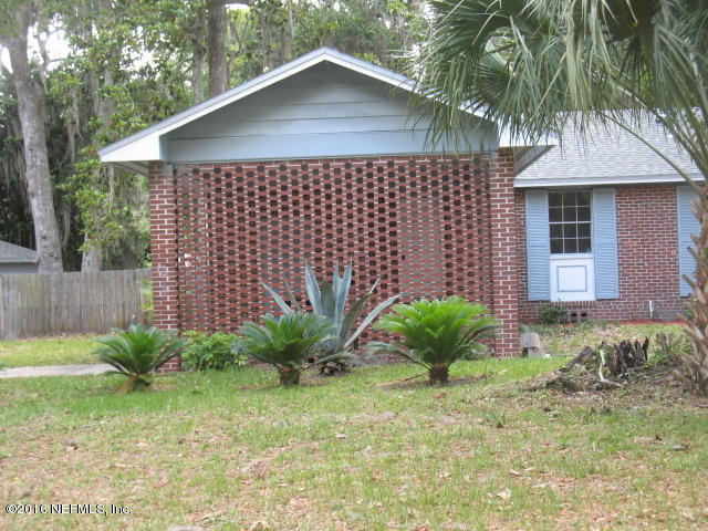 4504 Morris Road Jacksonville, FL 32225 - Photo 4 of 27 a front view of a house with garden
