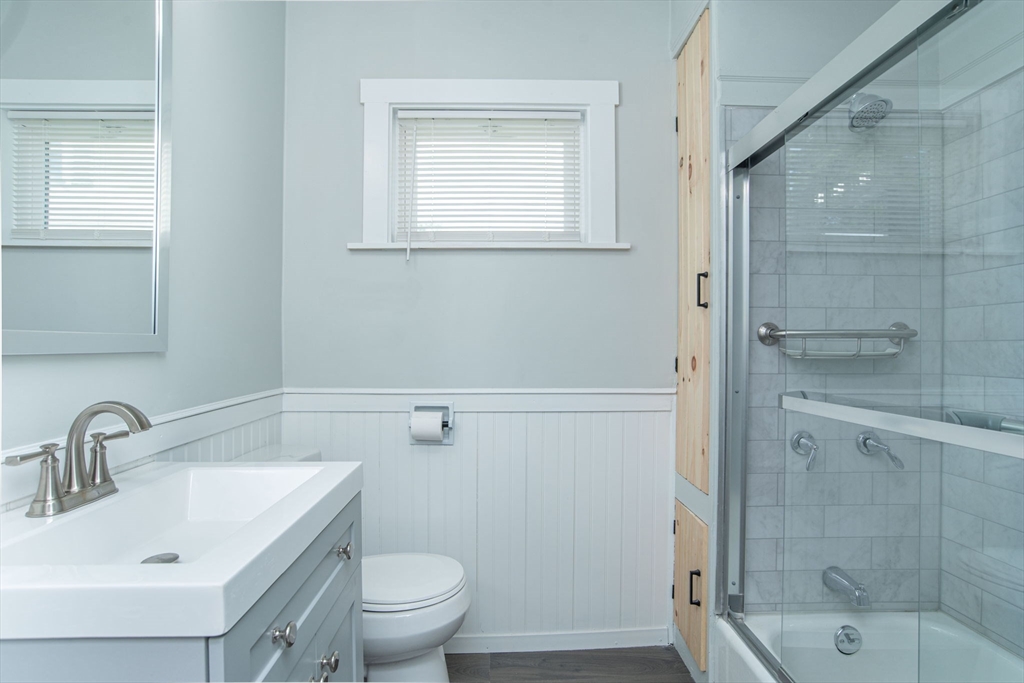 260 High Street Cumberland, RI 02864 - Photo 14 of 42 a bathroom with a sink toilet and shower