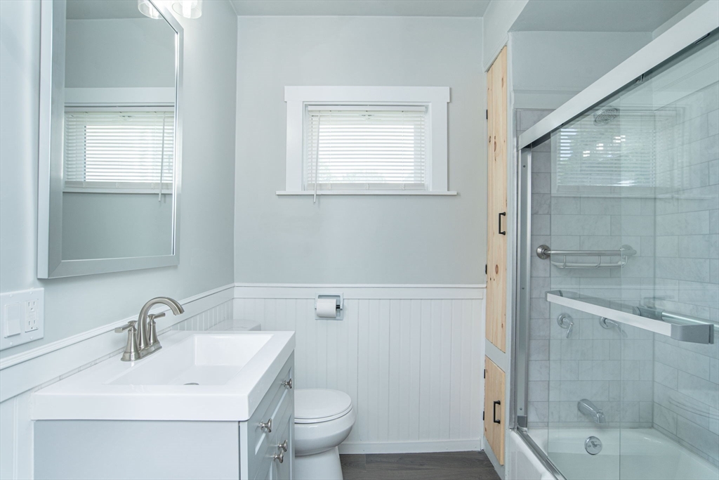 260 High Street Cumberland, RI 02864 - Photo 15 of 42 a bathroom with a sink toilet and shower