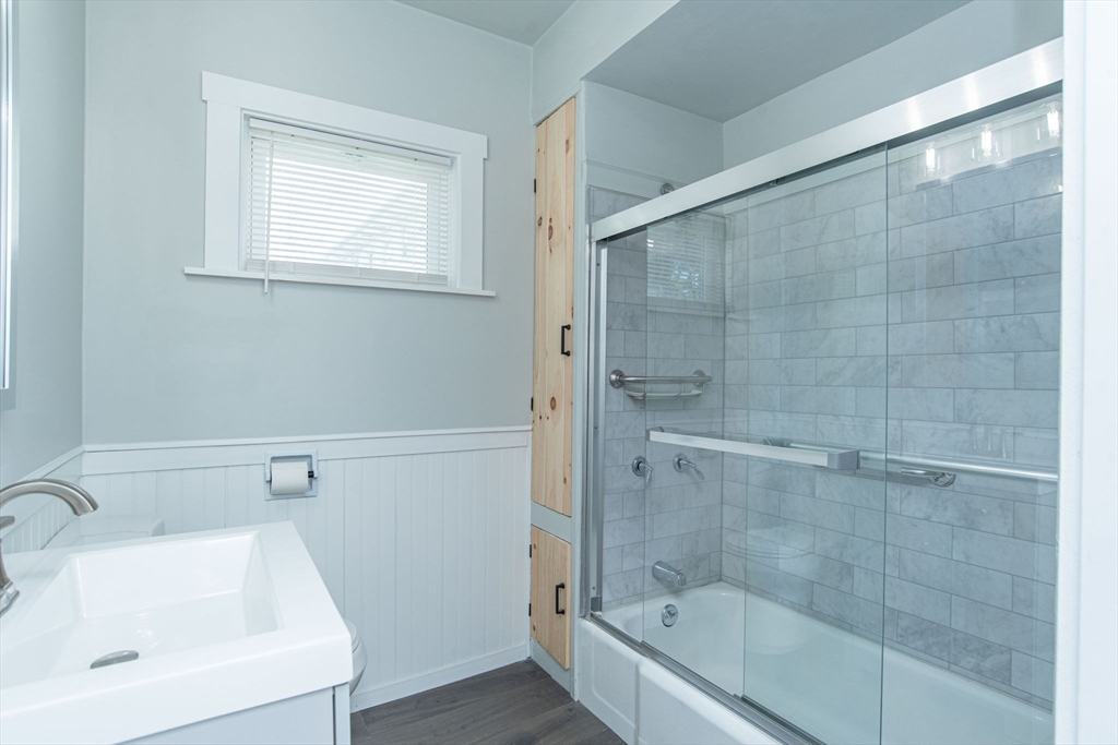 260 High Street Cumberland, RI 02864 - Photo 16 of 42 a bathroom with a sink and a bathtub